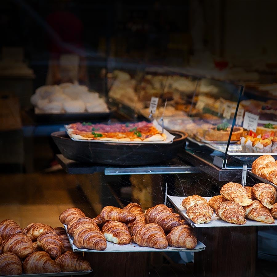 Picture of a display of croissants in a bakery as local businesses can be supported using Visa digital payments